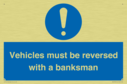 vehicles-must-be-reversed-with-a-banksman~